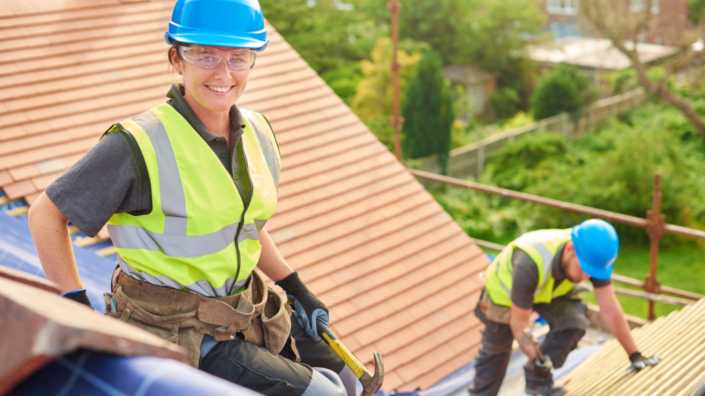 Professional commercial roofing team on a completed Detroit roof