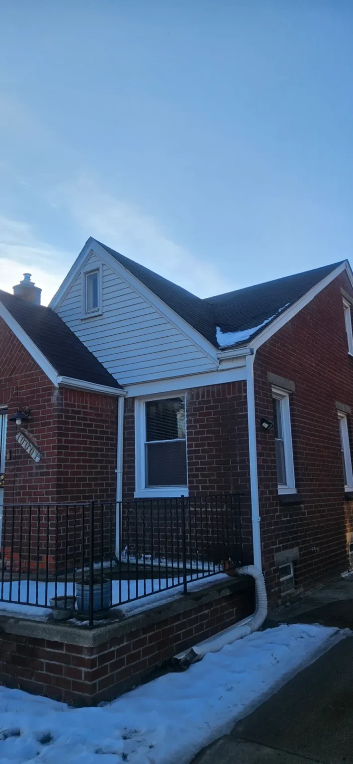 Brick home with gable roof – T&M Roofing project
