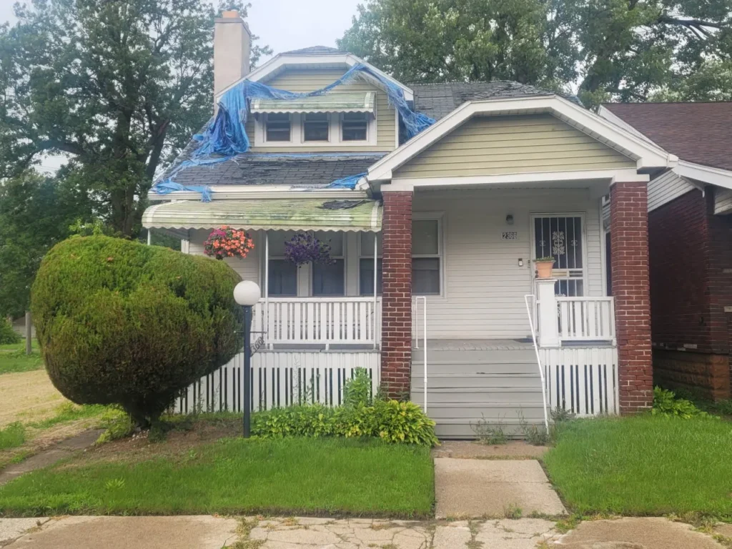 Bungalow with storm tarp