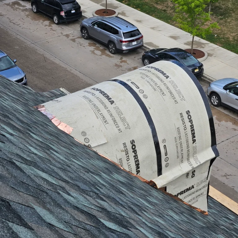 Roof installation by T&M Roofing: Ice and water shield membrane being installed