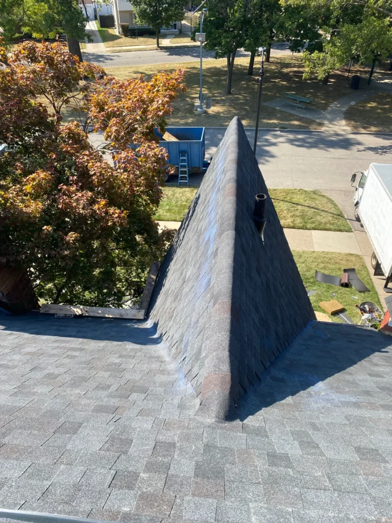 New shingles at the ridge and chimney