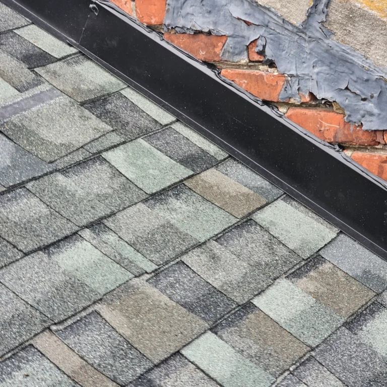 Flashing where the roof meets brick – T&M Roofing project in Metro Detroit