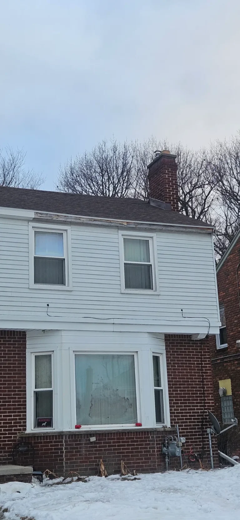White siding home roof