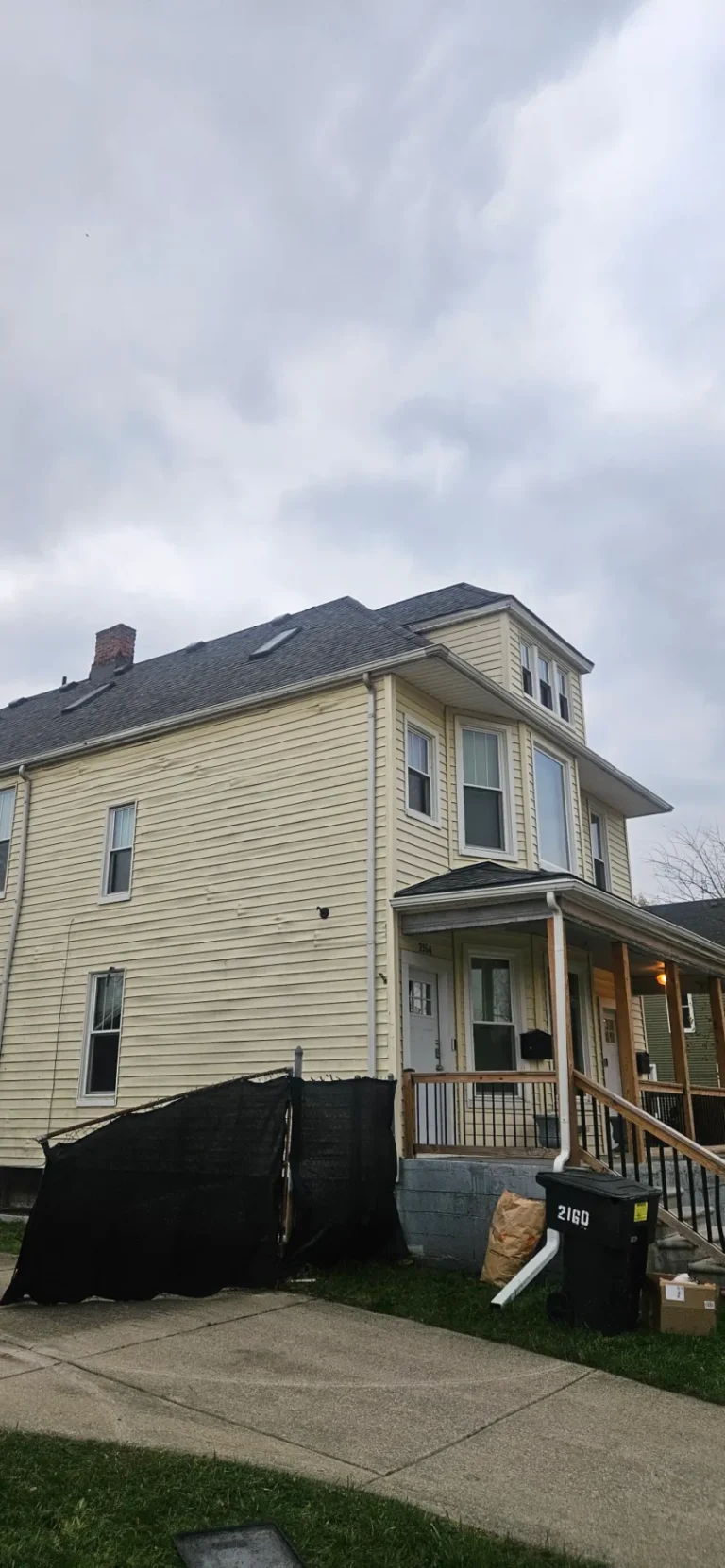 Home with new shingles and dormer